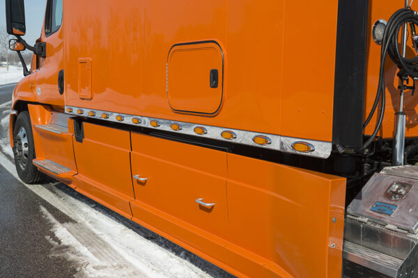 Bolt_150_inch_Platinum_Series_sleeper_orange_Flirt_Skirt_driver Bolt_150_inch_Platinum_Series_sleeper_orange_Flirt_Skirt_driver