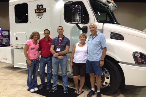 Bolt_team_with_Bob_and_Linda_Caffees_new_truck